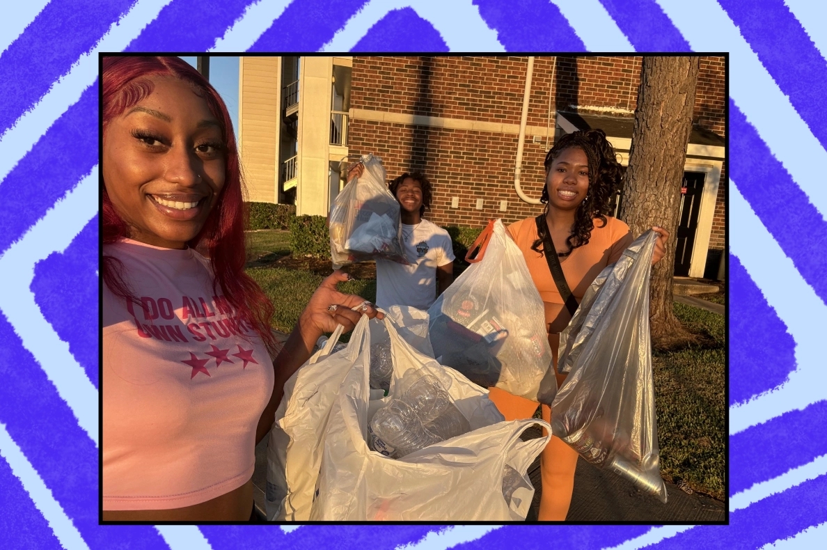 A group of three volunteers smiles while holding bags filled with collected trash during a community cleanup event. The scene showcases their commitment to civic engagement and environmental stewardship.